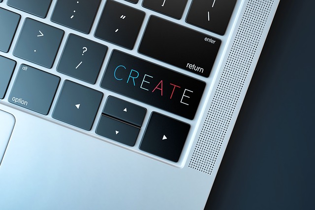 Klávesnica notebooku s klávesom s nápisom „CREATE“